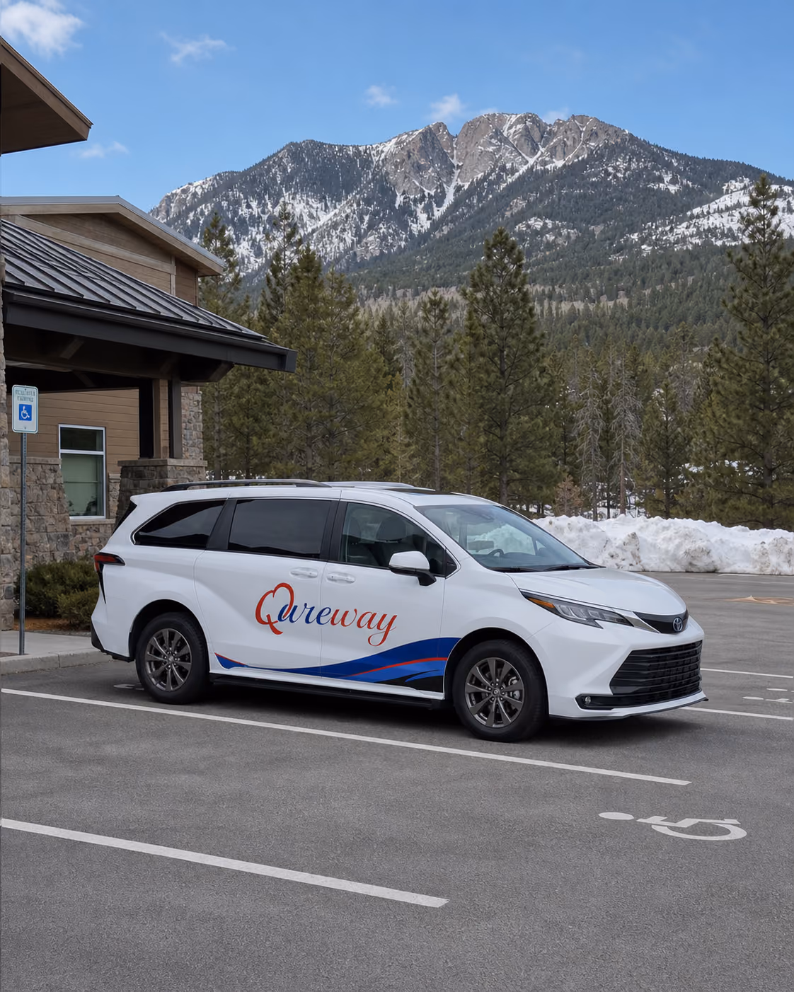 A Qureway wheelchair-accessible van traveling through Colorado's central mountains